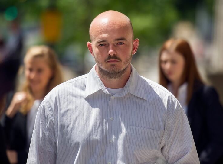 FILE - In this June 11, 2014 file photo, former Blackwater guard Nicholas Slatten leaves federal court in Washington, after the start of his first-degree murder trial. 