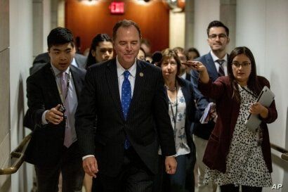 House Intelligence Committee Chairman Rep. Adam Schiff of Calif., leaves a secure area where Deputy Assistant Secretary of…