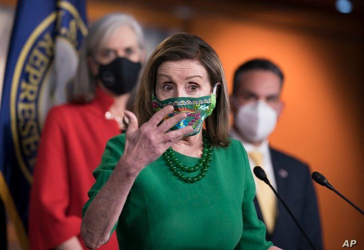 Speaker of the House Nancy Pelosi, D-Calif., meets with reporters before the House votes to pass a $1.9 trillion pandemic…