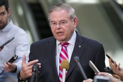 Democratic Sen. Bob Menendez speaks with the media on Capitol Hill in Washington, March 5, 2019.