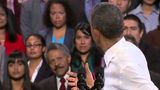 Obama deals with heckler at immigration event