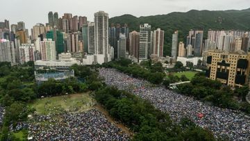 Huge crowds march peacefully in Hong Kong