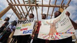 Supporters of the Deferred Action for Childhood Arrivals Act (DACA) and others demonstrate outside the U.S. District Court 9th Circuit in Pasadena, California, May 15, 2018.