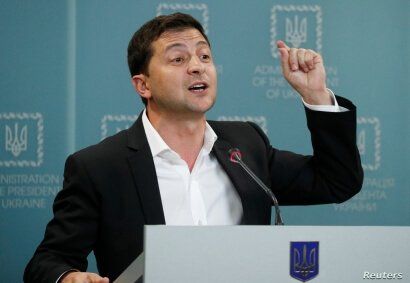 FILE - Ukrainian President Volodymyr Zelenskiy speaks during a news conference in Kyiv, Ukraine, Oct. 1, 2019.