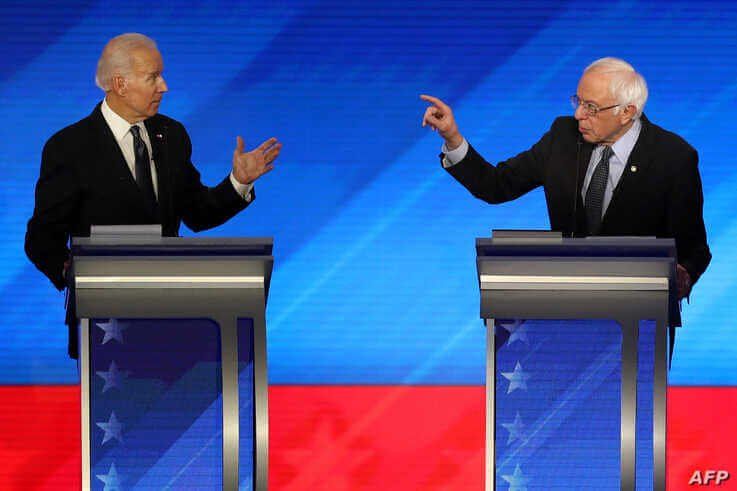 MANCHESTER, NEW HAMPSHIRE - FEBRUARY 07: (L-R) Democratic presidential candidates former Vice President Joe Biden and Sen…