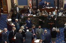 FILE - Senators are seen debating on the Senate floor on Capitol Hill in Washington, Feb. 10, 2021. (Senate Television via AP)