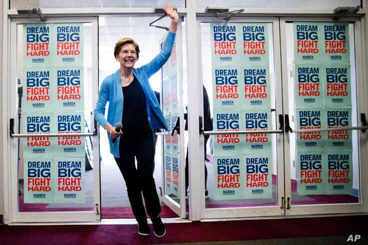 Democratic presidential candidate Sen. Elizabeth Warren, D-Mass., waves to supporters and volunteers, Feb. 29, 2020, in S.C.