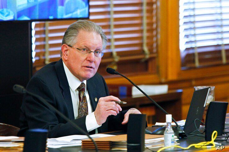 Kansas state Sen. Mike Thompson, R-Shawnee, makes a point during a Senate Judiciary Committee meeting on a bill rewriting the…