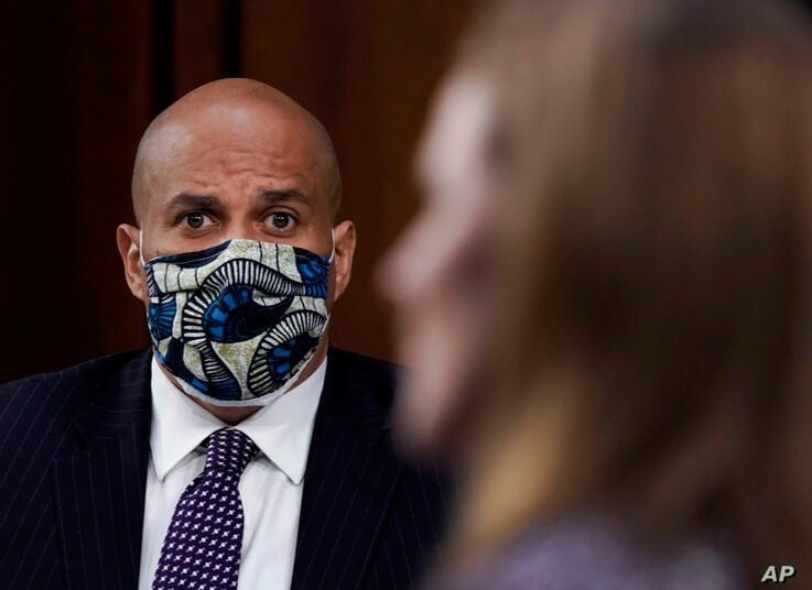 Sen. Cory Booker, D-N.J., listens during the confirmation hearing for Supreme Court nominee Amy Coney Barrett, before the…