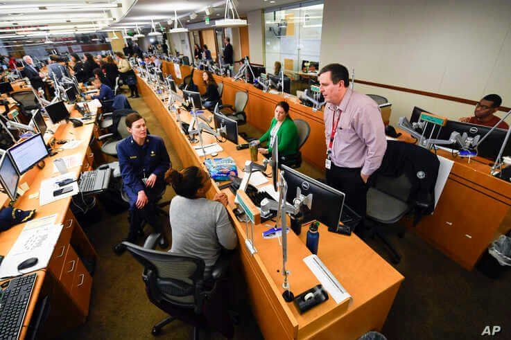 Personnel at the The Centers for Disease Control and Prevention (CDC) work the Emergency Operations Center in response to the 2019 Novel Coronavirus.