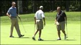 Raw: Obama tees off vacation at golf course