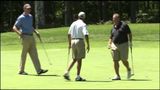 Raw: Obama tees off vacation at golf course