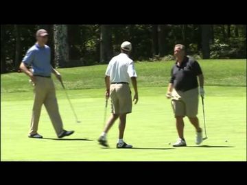 Raw: Obama tees off vacation at golf course