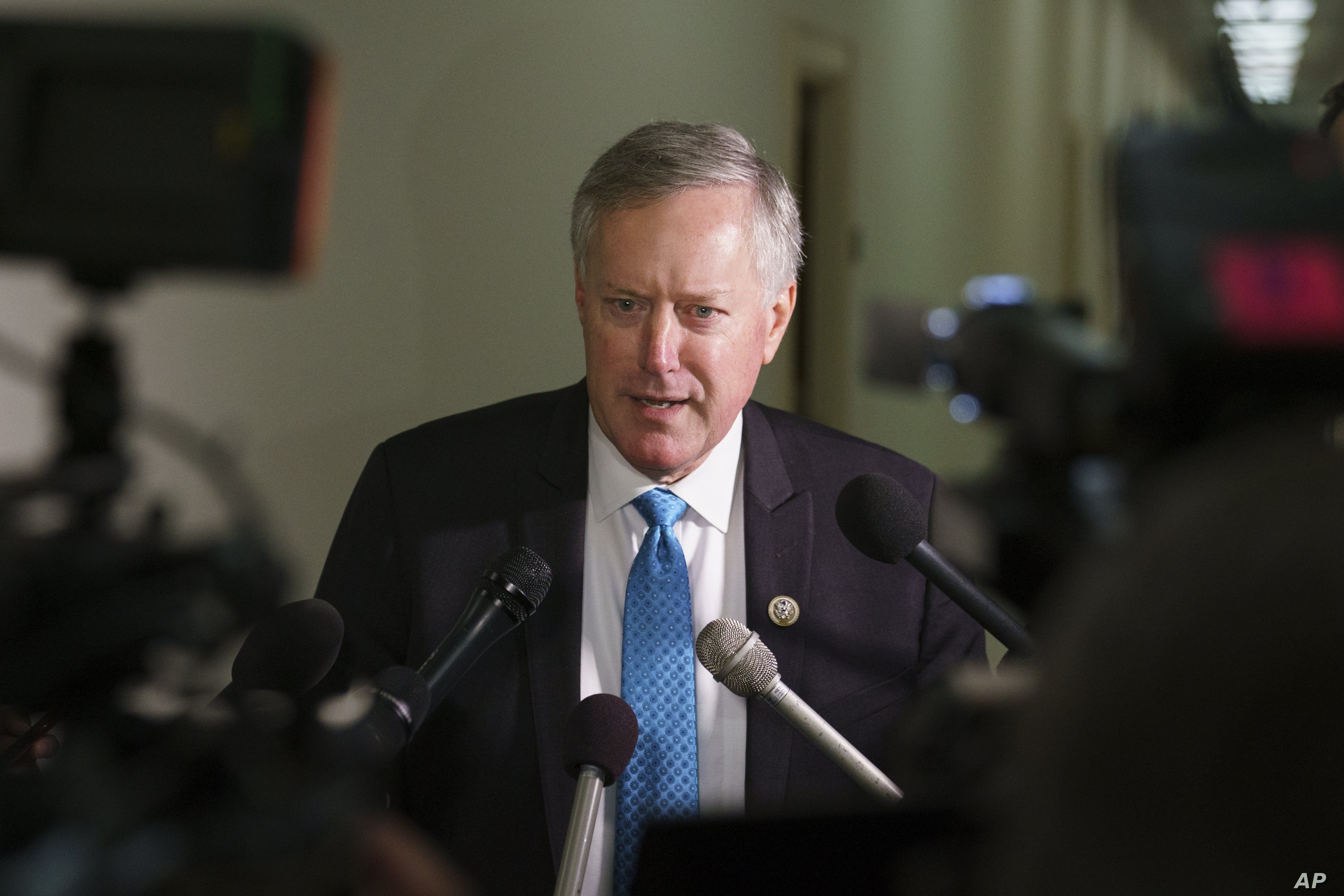 FILE - Rep. Mark Meadows, R-N.C., speaks to media on Capitol Hill in Washington as lawmakers clashed over science, ethics and politics at a House hearing, Dec. 13, 2018.