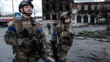 Ukrainian troops prepare to retake city that Russian leaders say they abandoned