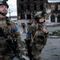 Ukrainian troops prepare to retake city that Russian leaders say they abandoned