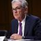 Fed announces it will begin slowing economic aid as inflation continues to rise