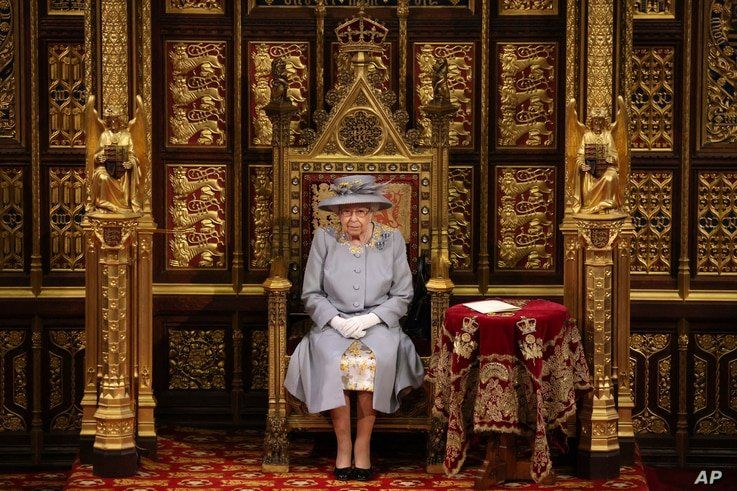 Britain's Queen Elizabeth II delivers a speech in the House of Lords during the State Opening of Parliament, at the Palace of Westminster in London, May 11, 2021.