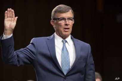 FILE - Retired Vice Adm. Joseph Maguire appears at a hearing on Capitol Hill in Washington, July 25, 2018. President Donald Trump has named Maguire acting national intelligence director.
