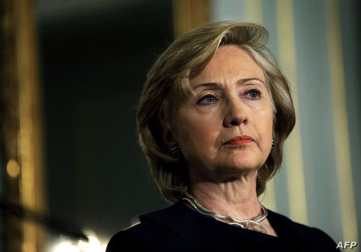 US Secretary of State Hillary Rodham Clinton looks toward the press during a a press conference with Britain's Foreign…