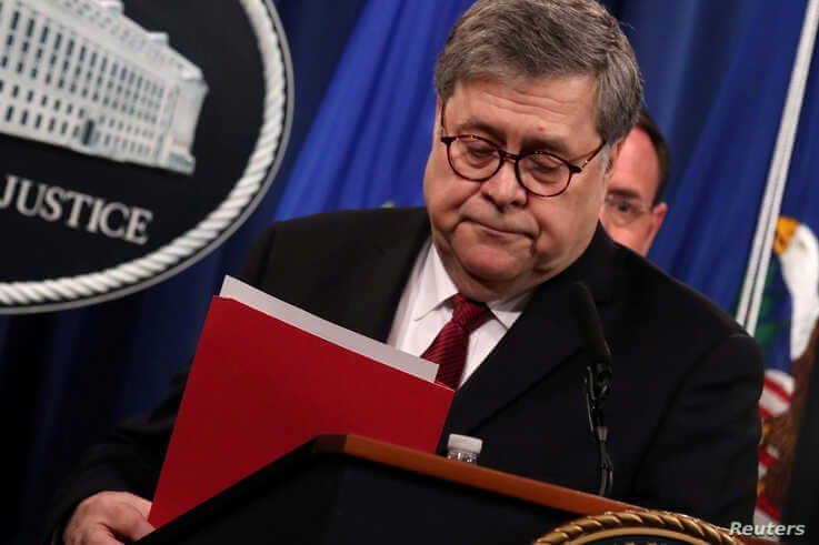 FILE - U.S. Attorney General William Barr departs after speaking at a news conference to discuss Special Counsel Robert Mueller's report on Russian interference in the 2016 U.S. presidential race, in Washington, U.S., April 18, 2019. 