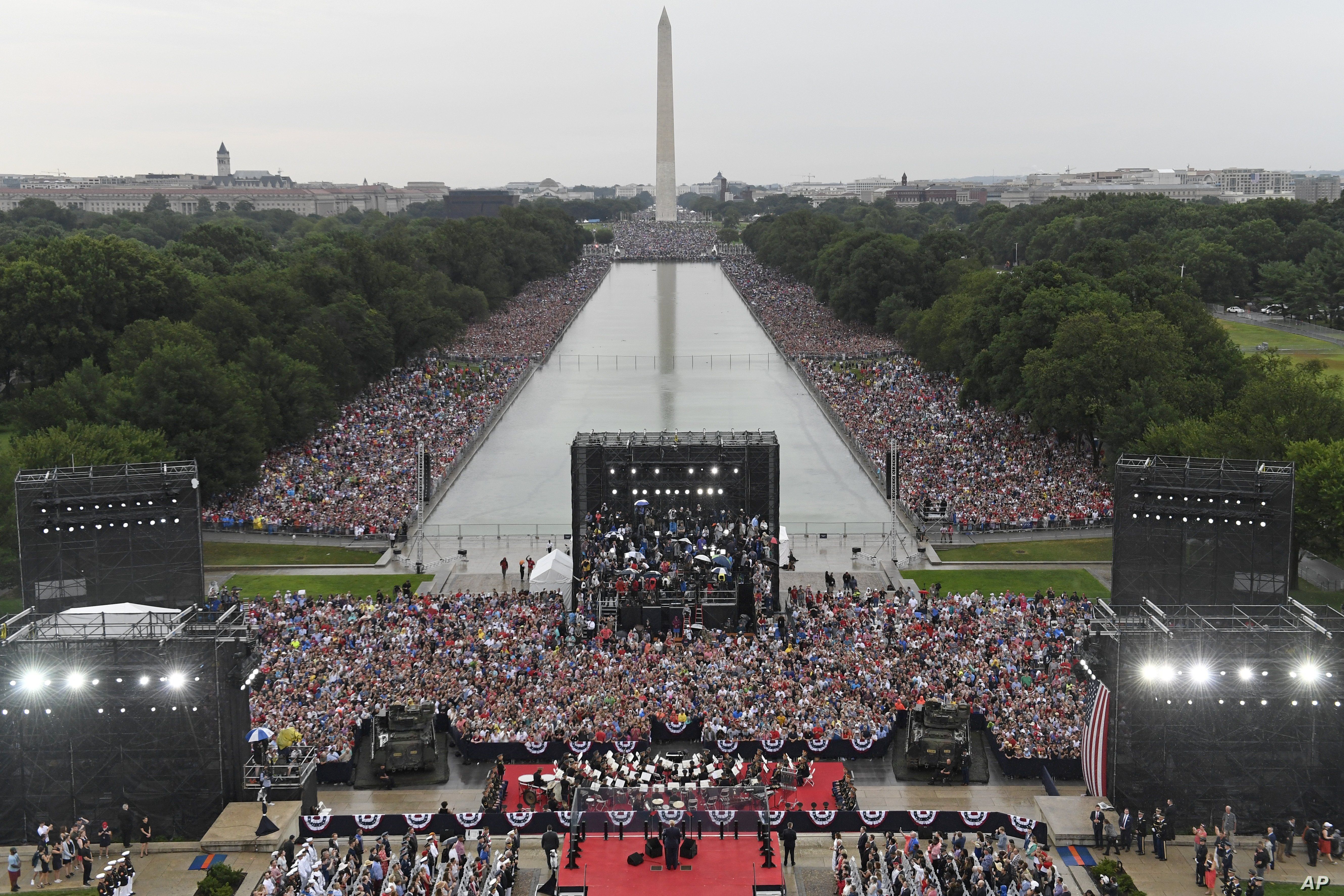 President Donald Trump speaks during an Independence Day celebration in front of the Lincoln Memorial in Washington, July 4, 2019. The Washington Monument and the reflecting pool are in the background. 