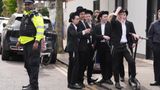 Two men stabbed in Jewish suburb of north London, suspect subdued and arrested