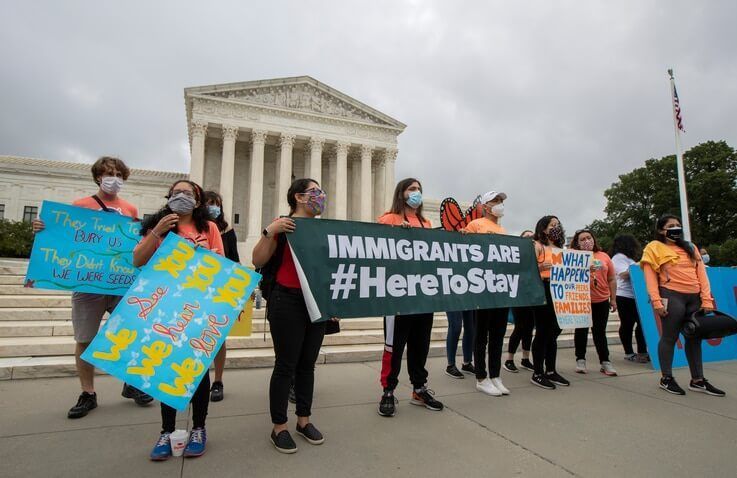 In this June 18, 2020, photo, Deferred Action for Childhood Arrivals (DACA) students celebrate in front of the Supreme Court…