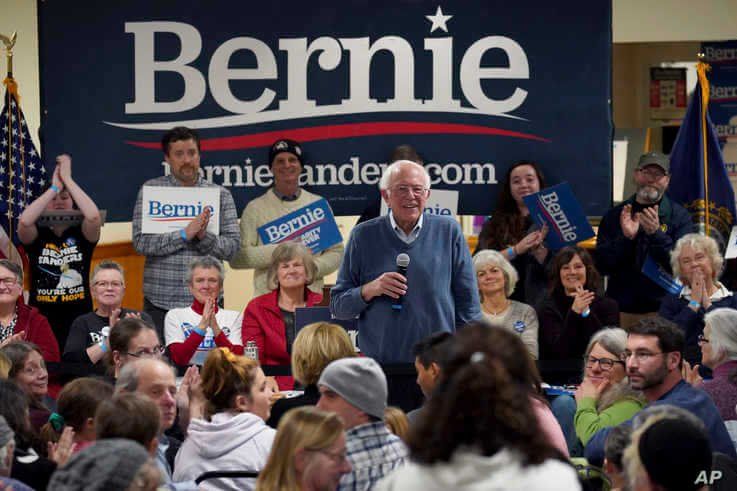 Democratic presidential candidate Sen. Bernie Sanders, I-Vt., smiles as he listens to a question from the audience during a…