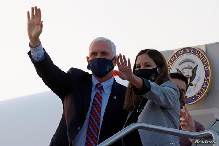 U.S. Vice President Mike Pence and his wife Karen arrive ahead of the vice presidential debate in Salt Lake City, Utah, U.S.,…