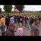 Crowd pushes through barriers to WWII Memorial