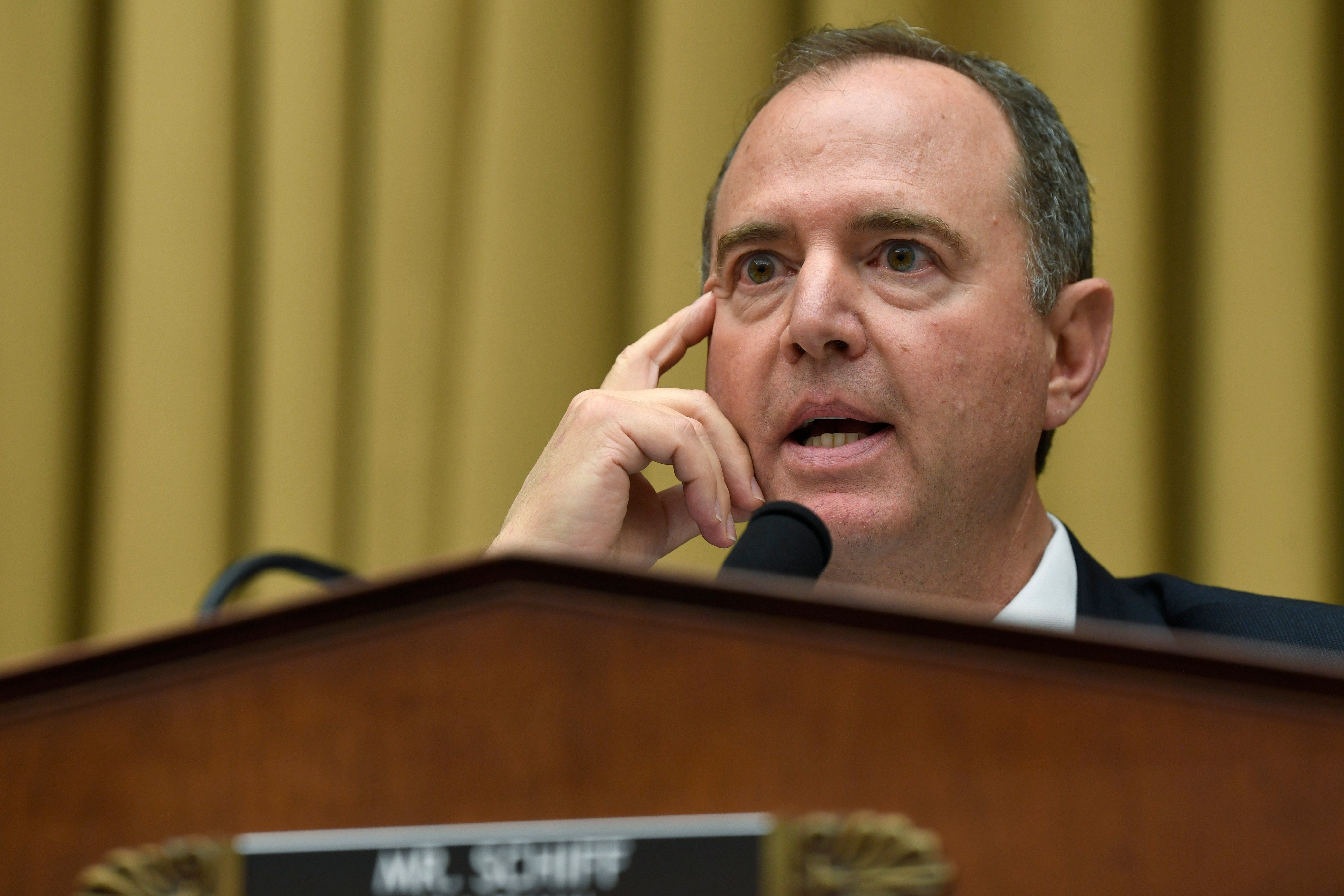House Intelligence Committee Chairman, Democratic Congressmen Adam Schiff, questions former special counsel Robert Mueller as he testifies before the committee on his report on Russian election interference, on Capitol Hill, in Washington, July 24, 2019. 