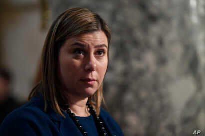 Rep. Elissa Slotkin, D-Mich., does a television interview on Capitol Hill in Washington, Wednesday, Dec. 18, 2019. (AP Photo…