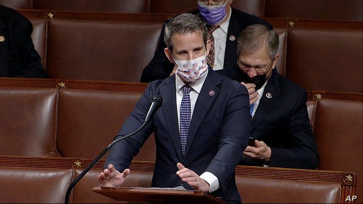 FILE - In this image from video, Republican Congressman Adam Kinzinger speaks at a House debate, at the U.S. Capitol in Washington, Jan. 7, 2021. (House Television via AP)