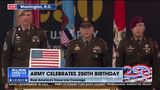 CUTTING THE CAKE WITH AN ARMY SABER