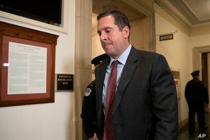House Intelligence Committee ranking member Rep. Devin Nunes, R-Calif., leaves Capitol Hill as the second public impeachment…