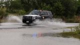 One person confirmed dead in Texas flooding as rescuers work to save people from rising water