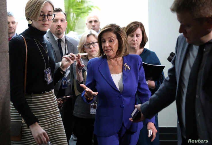 U.S. House Speaker Nancy Pelosi answers questions from reporters after leaving a House Democratic caucus meeting on Capitol…