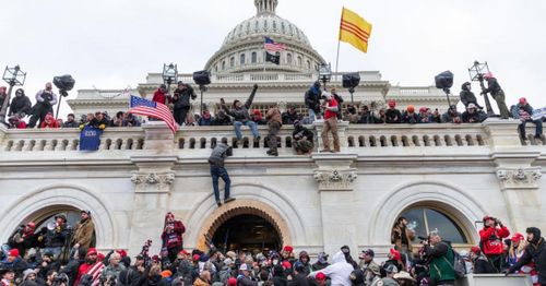 FBI searches retired Army sergeant's home, charges him with conspiracy in Capitol riot