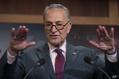 FILE - Senate Minority Leader Chuck Schumer of New York speaks to reporters on Capitol Hill in Washington, July 28, 2017, after the Republican-controlled Senate proved unable to repeal and replace the Affordable Care Act.