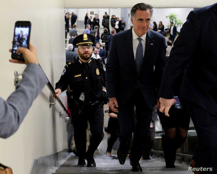 Sen. Mitt Romney (R-UT) walks through the Senate subway on his way to the Senate impeachment trial of President Donald Trump in…