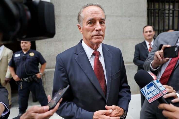 U.S. Rep. Chris Collins, R-N.Y., speaks to reporters as he leaves the courthouse after a pretrial hearing in his insider-trading case, in New York, Sept. 12, 2019.
