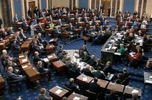 In this image from video, senators vote on the first article of impeachment during the impeachment trial of President Donald Trump, in the Senate at the U.S. Capitol in Washington, Feb. 5, 2020. 