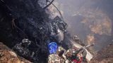 Plane carrying 72 people crashes while landing in Nepal resort town, dozens confirmed dead