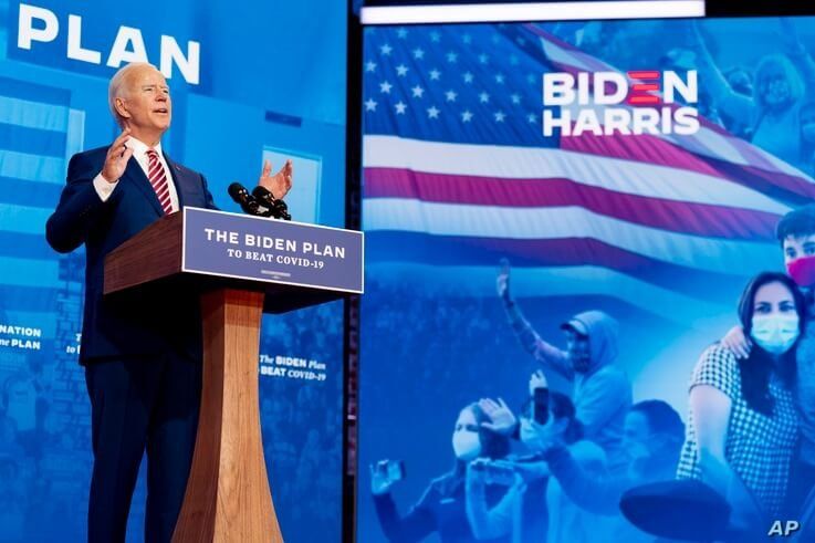 FILE - Democratic presidential candidate former Vice President Joe Biden speaks at The Queen Theater in Wilmington, Delaware, Oct. 23, 2020.