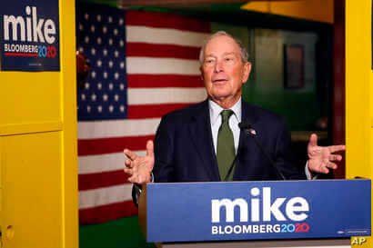 FILE - Democratic presidential candidate and billionaire Michael Bloomberg speaks to the media in Phoenix, Arizona, Nov. 26, 2019. 