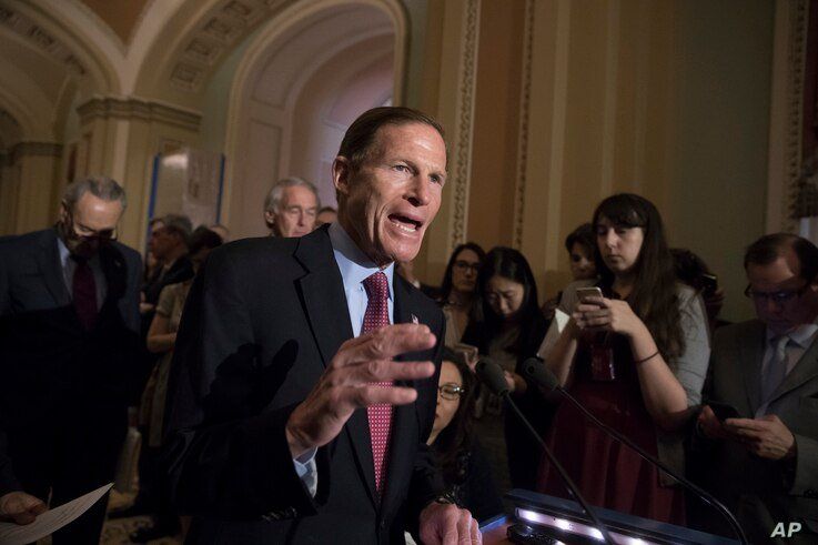 FILE - Sen. Richard Blumenthal, D-Conn., and other Democrats respond to questions from reporters about President Donald Trump reportedly sharing classified information with two Russian diplomats during a meeting in the Oval Office on Capitol Hill in 