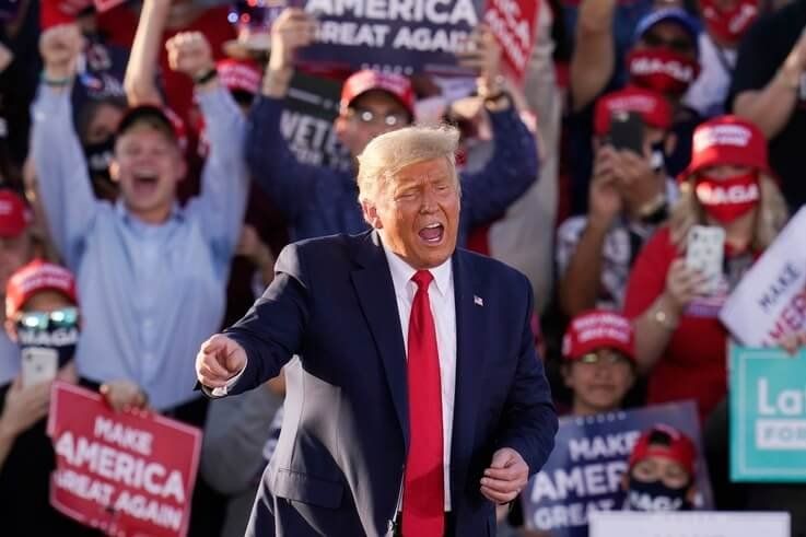 President Donald Trump works the crowd after speaking at a campaign rally Monday, Oct. 19, 2020, in Tucson, Ariz. (AP Photo…