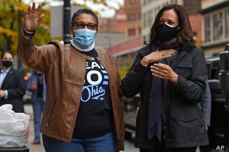 FILE - In this Oct. 24, 2020, file photo Democratic vice presidential candidate Sen. Kamala Harris, D-Calif. and Rep. Marcia…