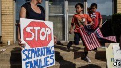 People protest against recent U.S. immigration policy that separates children from their families when they enter the US as undocumented immigrants, in front of a Homeland Security facility in Elizabeth, New Jersey, June 17, 2018.
